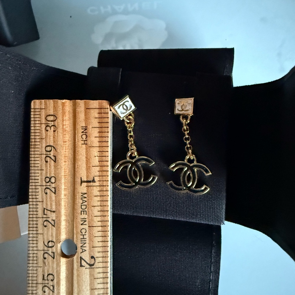 CHANEL dangling earrings black white resin new NIB NWT gold 2024